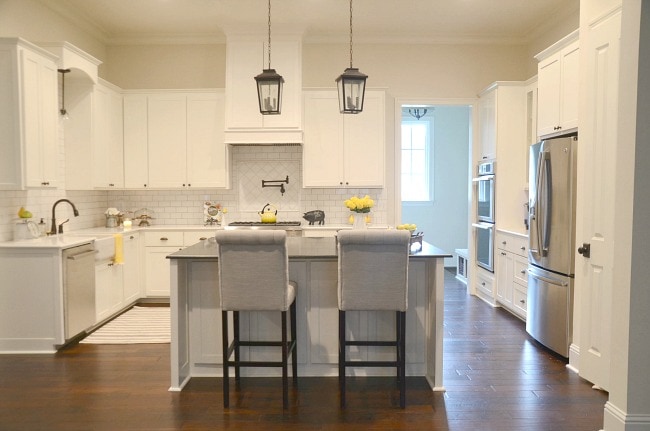 At Home with Aimee: all white kitchen with New Orleans lanterns